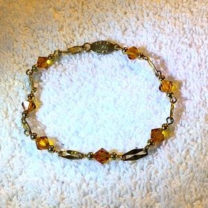 Vintage Austrian U.S.A. Crystal necklace, amber and gold colored